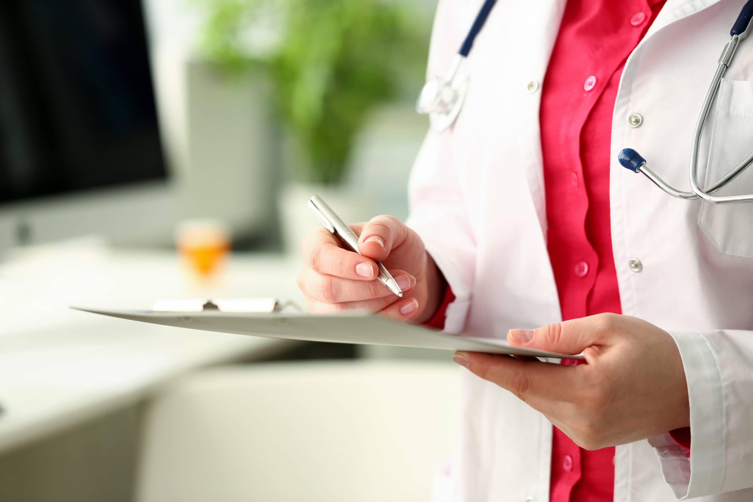 Close Up Of Competent Doctor That Checking List