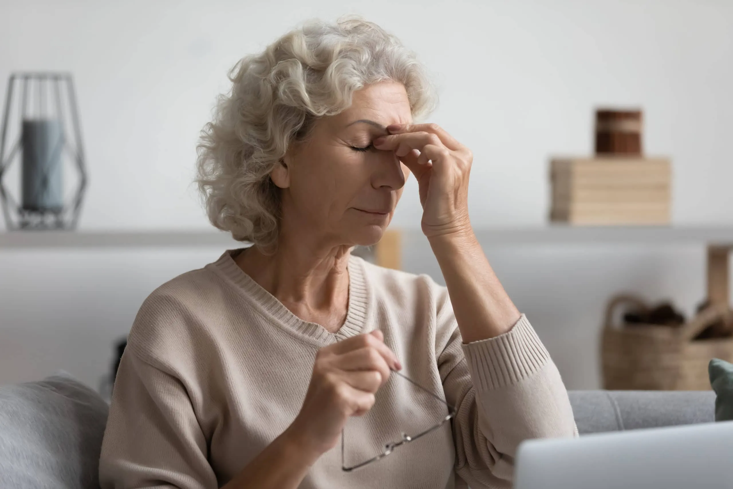 Exhausted,senior,older,woman,taking,off,glasses,,suffering,from,dry