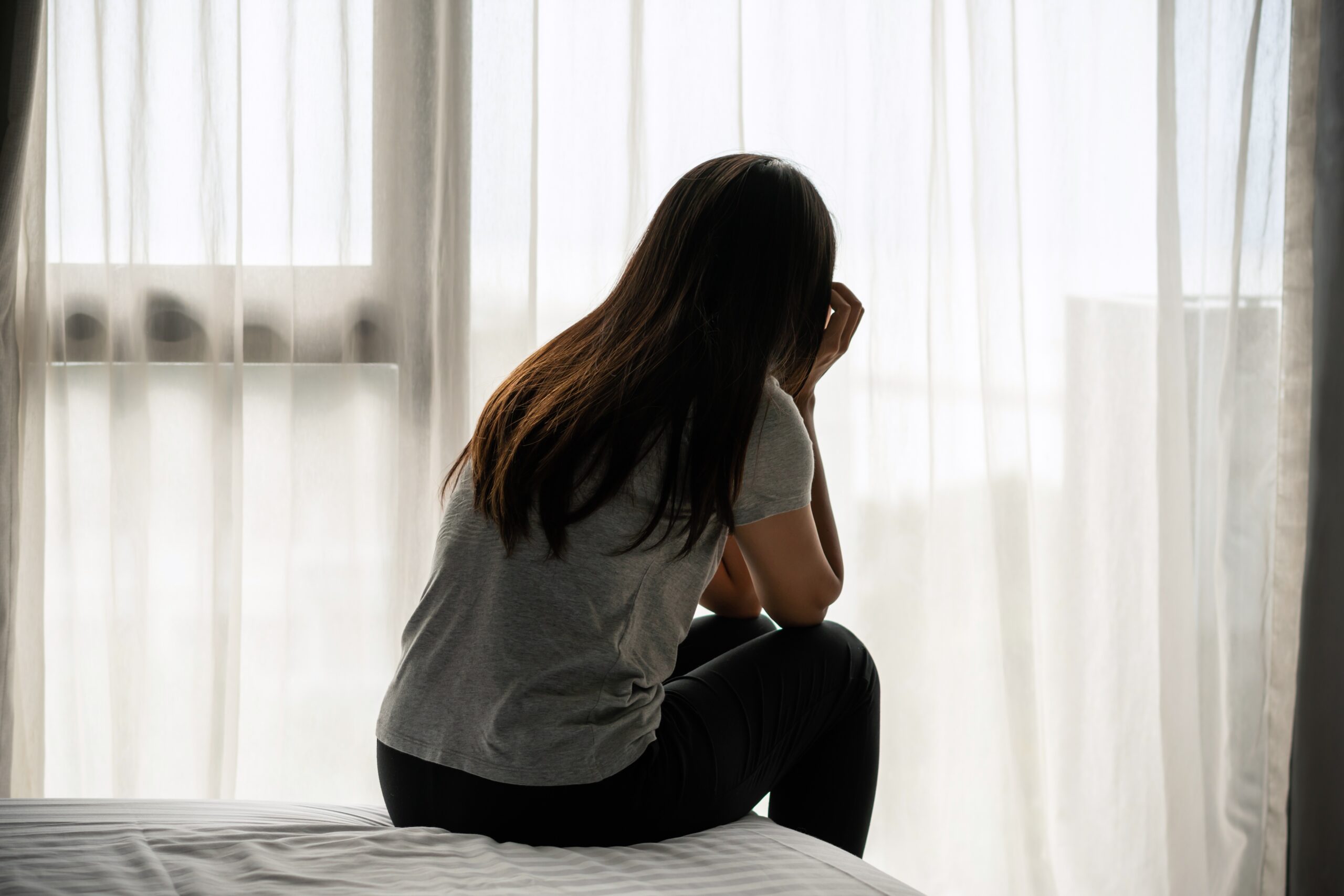 Stressed,young,asian,woman,suffering,on,depression.,lady,wake,up