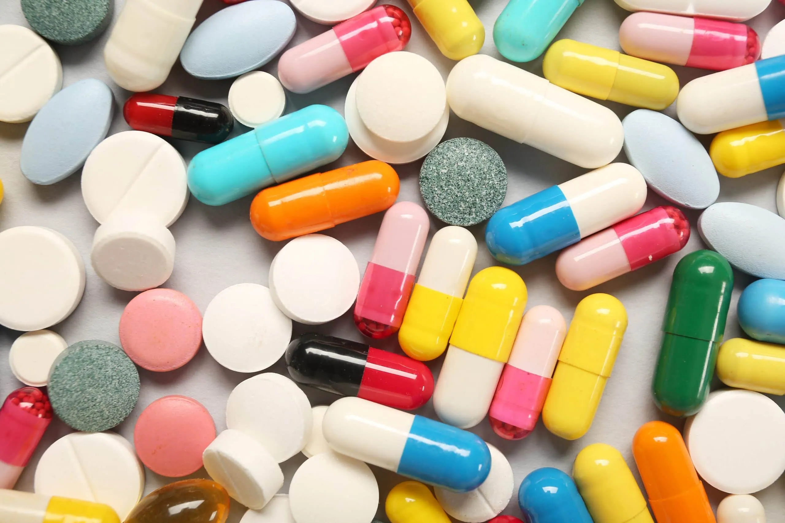 Different,pills,on,grey,background
