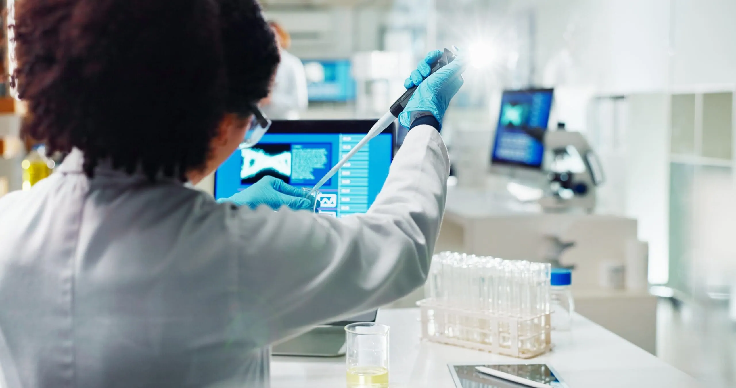 Test,tubes,,pipette,and,woman,scientist,in,laboratory,for,medical